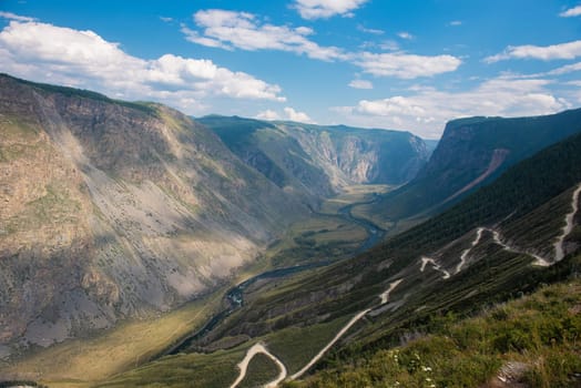 Panorama of the Katu Yaryk mountain pass and the valley of the river of Chulyshman. Altai Republic, Russia, beautiful summer day