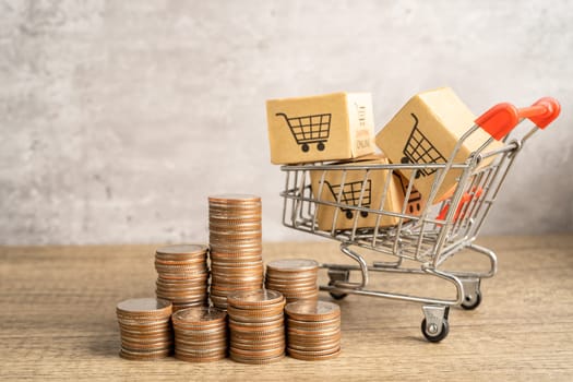 Shopping cart logo on box with stack of coins. Banking Account, Investment economy, trading, Business import export online company concept.