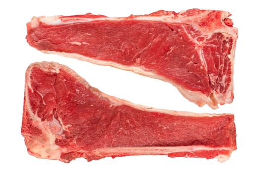 Two pieces of beef with a bone. Large pieces of beef with bone isolated on a white background. A pieces of juicy beef isolated on a white background to insert into a design or project