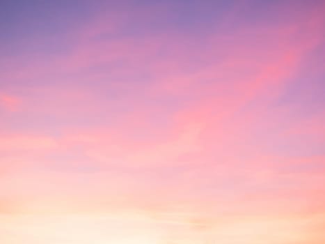 Moody pink, purple clouds sunset sky with long shutter. Majestic dusk. Sunset sky twilight in the evening with colorful sunlight. Pastel colors. Abstract nature background.