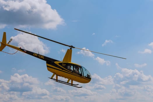 15 July 2021 Skutec, Czech Republic. Pilot skillfully maneuvered helicopter through the air, showcasing their expertise in helicopter flying.