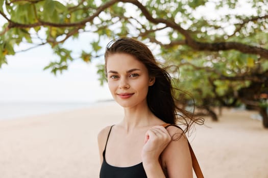 woman sunlight travel smile coast long happiness freedom walking ocean nature hair sunset beautiful vacation summer sea young beach sand walk enjoyment