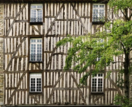Facade of a typical medieval half-timbered house in the French city of Rennes.