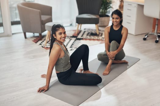 Friends, yoga exercise and portrait of women together in a house with a smile, health and wellness. Indian sisters or female family in a lounge while happy about workout and fitness with a partner.