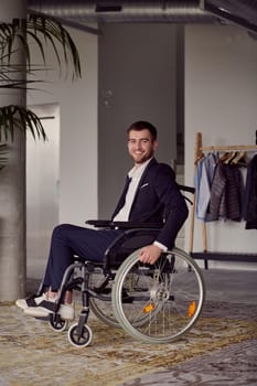 Businessman in a wheelchair commands attention, symbolizing resilience and success amidst a dynamic modern office environment