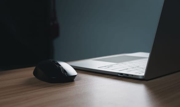 computer on wood table. business concept and communication technology.