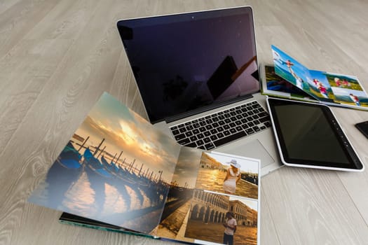 laptop, computer, smartphone, photo book.