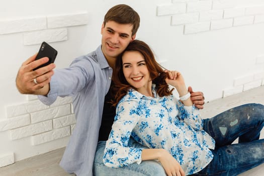 Couple lying on the floor.