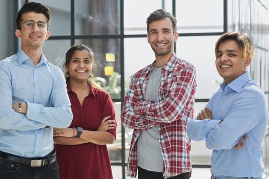Successful business team smiling while standing in the office