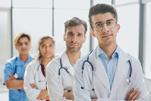 portrait of a multiethnic group of doctors standing in a row