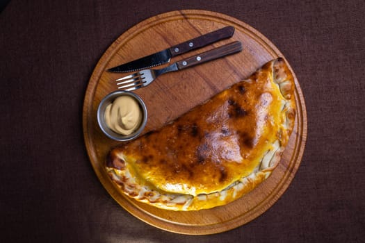 hot homemade pie on the table. pie with filling.