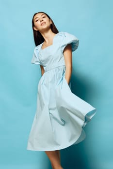 makeup woman summer hair fashion attractive female pastel dress isolated young pretty studio style girl joy blue beautiful model positive slim