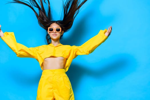 sunglasses woman stylish outfit attractive joy lifestyle trendy yellow emotion happiness blue: portrait dance girl monochrome young funny beautiful beauty glasses fashion