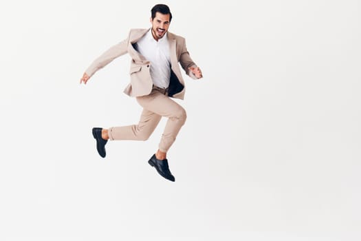 business man work person studio beige professional jumping victory male running success smiling background winner eyeglass occupation suit happy businessman up