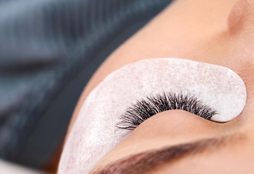 Beautiful Woman with long lashes in a beauty salon
