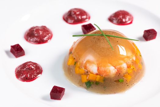 Aspic recipe, jelly made from a broth of prawns and peppery beetroot. High quality photo