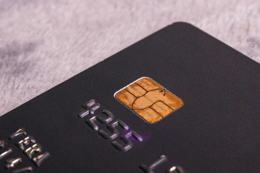 Bank card on a gray background close up