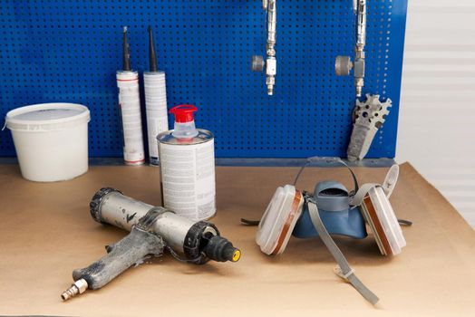 airbrush for car painting, spray gun or pistol in auto repair shop