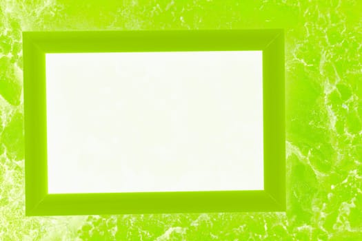 a rigid structure that surrounds or encloses something such as a door or window. Glowing light in a green delicate frame.Place for text.