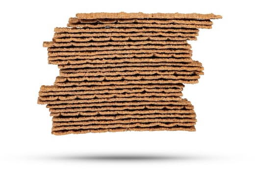 Texture of rye chips on a white background. The chips are stacked one on top of the other, close-up side view. Toasted slices of bread for sandwiches. High quality photo