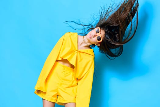 woman lady trendy happiness attractive yellow fashion gesture young isolated portrait funny sunglasses female joyful beautiful person background pretty girl lifestyle