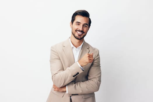 man businessman young portrait business executive happy smile tie success smiling stylish studio suit attractive copyspace crossed handsome eyeglass isolated beige