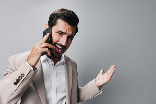 blogger man male white hold copy space success handsome phone portrait angry suit call beard business holding smartphone isolated smile adult message