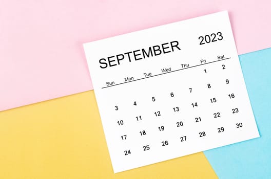 September 2023 Monthly calendar on colorful background.