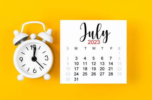 July 2023 Monthly calendar for 2023 year with alarm clock on yellow background.