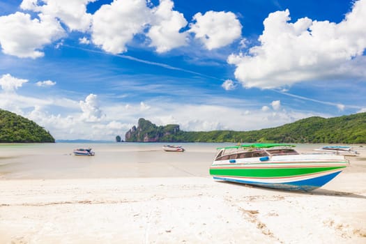 Boats landing in Phi-Phi Island with blue sky, Thailand