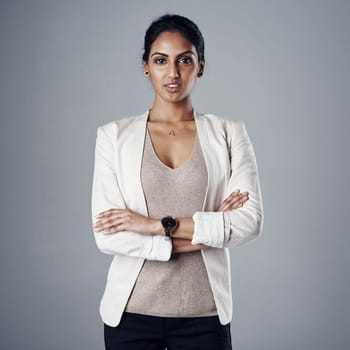 Nothing stands in my way of having a successful career. Studio portrait of a young businesswoman posing against a gray background
