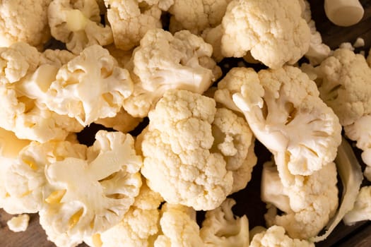 Close-up full frame shot of fresh cauliflower on table. unaltered, vegetable, healthy food, raw food and organic concept.