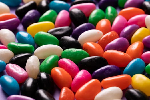 Close-up full frame shot of multi colored candies. unaltered, sweet food and unhealthy eating concept.