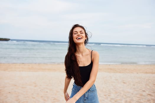 running woman wave smiling summer beach active ocean sea sunset vacation smile lifestyle female sun fun young bikini travel happy positive