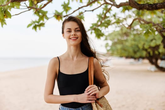 woman ocean sunlight shore tropical happy space adult dress sunset sky beauty copy nature summer vacation young smile beach freedom sand sea