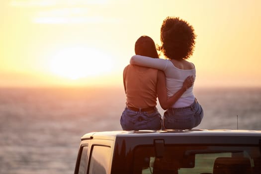 Love, gay and sunset with lesbian couple on car beach for relax, romance and sky mockup space. Lgbtq, freedom and pride with women hugging on nature date for partner, trust and summer vacation.