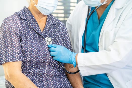 Doctor using stethoscope to checking the patient lie down on a bed in the hospital, healthy strong medical concept.