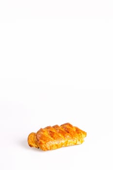 confection bun with raisins on a white background. Copy space