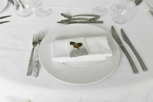 Table setting with cutlery and napkin