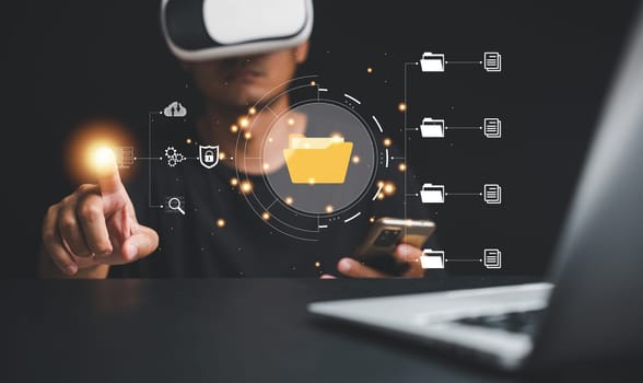 Virtual reality VR office setup featuring an IT consultant utilizing a Document Management System DMS. Emphasizing the importance of digital file organization in the modern business world.