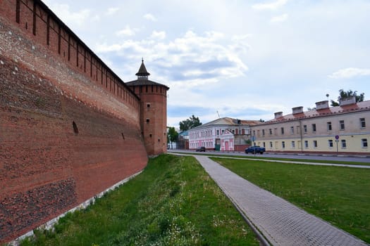 Kolomna, Russia - May 30, 2023: Street with a fortress wall in Kolomna city. Ancient Russian architecture