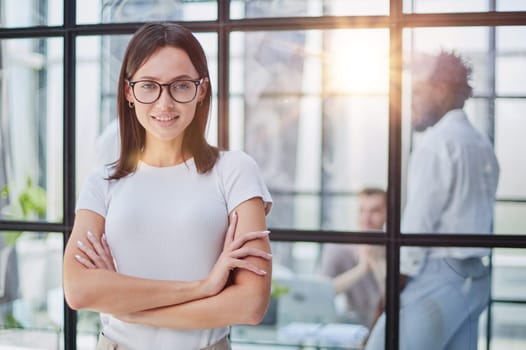 Portrait of a young business woman in an modern office