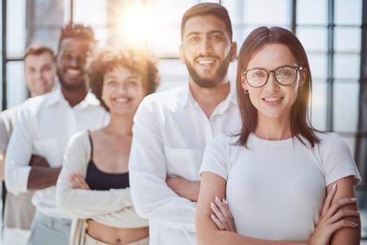 Face of beautiful woman on the background of business people