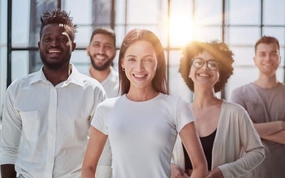 Face of beautiful woman on the background of business people