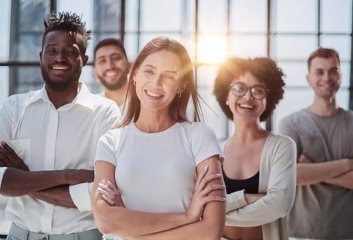 Face of beautiful woman on the background of business people