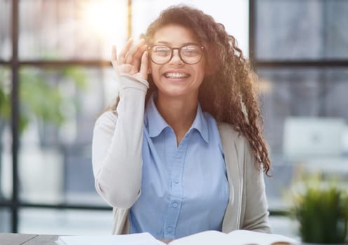 Focused agent girl, lawyer manager, sitting at workplace, working in office