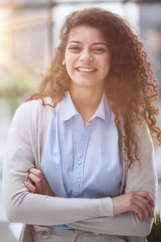 girl standing at modern office looking at camera