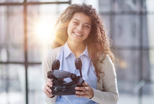 Girl trying to touch objects in virtual reality.