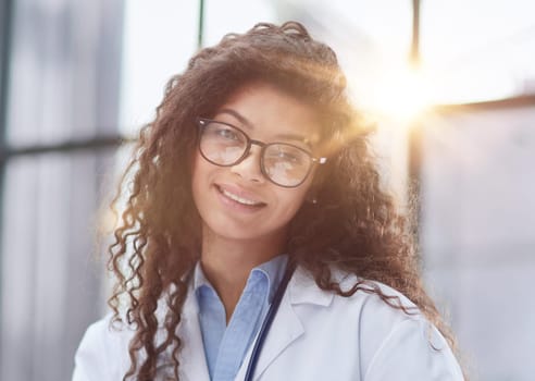 A young female specialist psychologist conducts online patient appointments