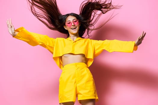 modern woman lady attractive girl young summertime female trendy monochrome beautiful sunglasses expression person yellow lifestyle fashion hair dance glasses fun long